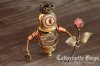 steampunk_minion_robot_king_holding_a_rose_by_catherinetterings-daj2xx7.jpg