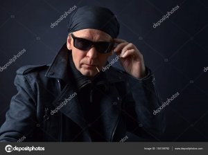 depositphotos_150109792-stock-photo-rocker-with-sunglasses-on-black.jpg